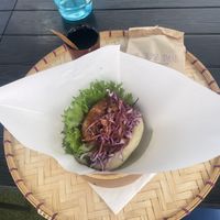 Vegan meat patty with BBQ sauce and a matcha donut   at Luu's Bao in Osaka