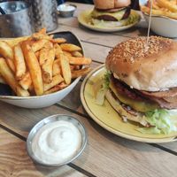 Double bacon burger and paprika fries with garlic dip at Herbivorous - Withington in Manchester