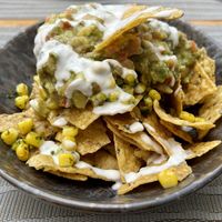 Nachos w/ guac   at Hablemos Coco Cafe in Puerto Natales