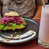 Seitan burger with a raspberry and banana smoothie at Hablemos Coco Cafe in Puerto Natales