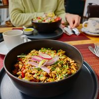 Thai curry and La encurtida (in the background) at Hablemos Coco Cafe in Puerto Natales