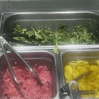 arugula that comes on the vegan heat & it’s full of cheese   at &pizza in Union