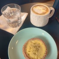 Lemon tart and cappuccino at I Quit - Café & Bakery in Mexico City
