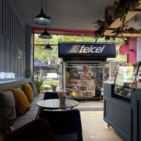 Indoor and outdoor seating  at I Quit - Café & Bakery in Mexico City