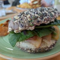 Hummus sandwich filled with unripe tomato at Feria 83 in Sevilla