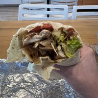 Grilled C Wrap- Grilled vegan chick'n, grilled onions, cabbage, carrot, lettuce, tomato, with 1000 Island dressing. Wrapped in a flour tortilla.  at Envegan in East Point