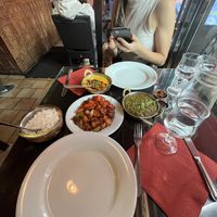 Basmati rice, dragon potatoes, saag bhajees and dal🤤🤤  at Annapurna in Chamonix-mont-blanc