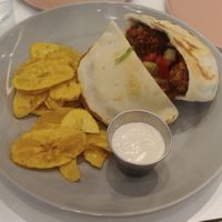 Falafel Pocket with fried plantain: chickpeas balls, tomato, cucumber, lettuce, tahini & pita bread.

 at Kitchen in Panama City