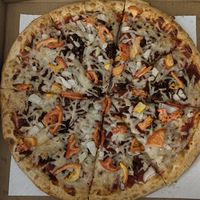 "cheeseburger" pizza, sub ground beef/cheddar cheese/bacon for ground round and daiya cheese. at Scooters Pizza in Valemount