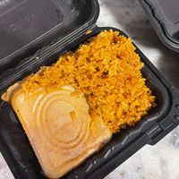 Moi Moi & Jollof Rice at Motherland Kitchen in Frederick