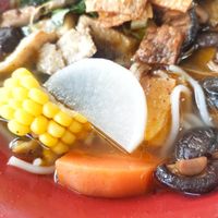 White radish, black mushroom, red carrot, yellow sweet corn and pineapple cube at Bún Huế Cafe in Central Singapore
