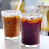 Iced viet coffee. Front one is oat mylk version  at Bún Huế Cafe in Central Singapore