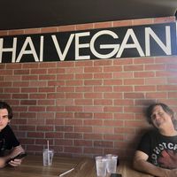 The fam seated outdoors   at Thai Vegan in Santa Monica