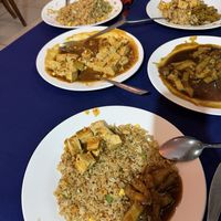 Vegetable fried rice, tofu dish, eggplant dish  at Peace in Arusha