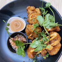 Chipotle cauliflower wings (really nice & the sauce was delicious)   at Madre in Amsterdam