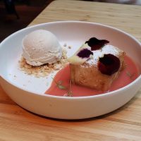 Brioche soaked in tres leches with guava salsa and ice cream at Madre in Amsterdam