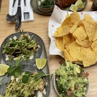 Artichoke Tacos (left), Guacamole and Chips (middle), ‘pork’ tacos (at the back) at Madre in Amsterdam