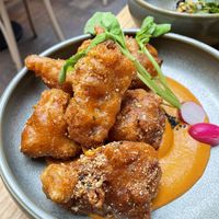 Chipotle mole cauliflower wings  at Madre in Amsterdam