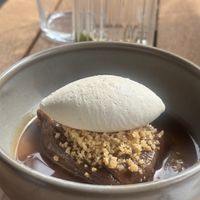 Date toffee dessert with vanilla bergamot ice cream 🍦   at Madre in Amsterdam