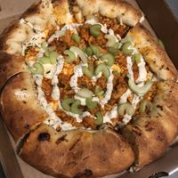 Buffalo chicken with cheese stuffed crust at Pi Vegan Pizzeria in Seattle