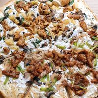 Half thai chick’n, half bbq chick’n at Pi Vegan Pizzeria in Seattle