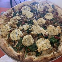 Build your own large pizza with cashew ricotta 😋 at Pi Vegan Pizzeria in Seattle
