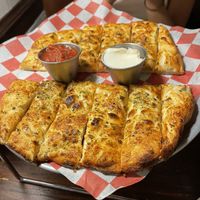 The cheesy garlic strips are so so good. And this dipping sauces ahh.  at Pi Vegan Pizzeria in Seattle