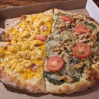 Half and half - Mac and cheese plus pesto pie at Pi Vegan Pizzeria in Seattle