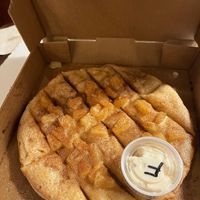 Cinnamon and pineapple dessert pizza  at Pi Vegan Pizzeria in Seattle