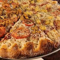 1/2 chicken parm 1/2 Hawaiian at Pi Vegan Pizzeria in Seattle