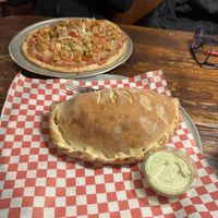 Magic Mike Calzone and the Chicken Parm GF Pizza. And the vegan ranch was SO good!   at Pi Vegan Pizzeria in Seattle