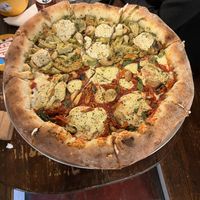 Custom pie: large size, stuffed crust, margarita fondita and okey dokey artichokey  at Pi Vegan Pizzeria in Seattle