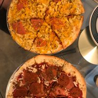 Mac and cheese pizza & meat lovers pizza! at Pi Vegan Pizzeria in Seattle