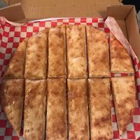 Cinnamon breadsticks for dessert.. These are a must!  at Pi Vegan Pizzeria in Seattle