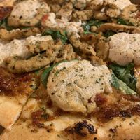 The sunny day. Sub the black olives and potatoes for chicken.  at Pi Vegan Pizzeria in Seattle