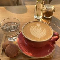 Latte with macaroons   at Share Sweet & Wine Bar in Prague