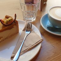 Maracuja cheesecake and cappuccino  at Share Sweet & Wine Bar in Prague