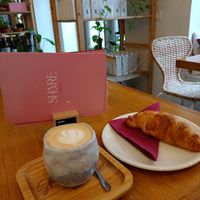 Cappuccino + croissant at Share Sweet & Wine Bar in Prague