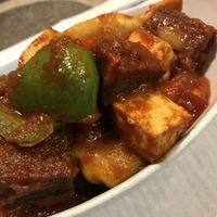 Mo-mo (dumplings) with tofu and seitan, tomato, onion and pepper  at Vegan Mount in Barcelona
