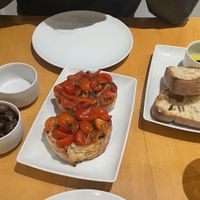 Antipasti - olives, bruschetta and homemade bread with olive oil & balsamico.  at Pizzeria Lume in Funchal