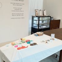 interior of location - view towards display table and counter #Veganuary at Vegan Pet Food - 비견 in Seoul