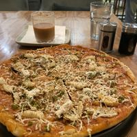 Vegan pizza   at Greenr Cafe in New Delhi