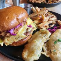 Phat stacks burger & Frickles. Strip Threes in the background. at V-EDGE in Middlesbrough