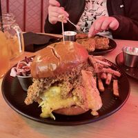 Phat Stacks Smash Burger - Brioche bun, cheezburger, onions, BBQ sauce, 2 huge chkn strips and cheez sauce. Bangin with a pound of fries  at V-EDGE in Middlesbrough