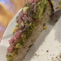 Amazing bread, fermented lemons & onions, high quality EVOO drizzle, chili flakes   at The Hub Cafe in Lincoln