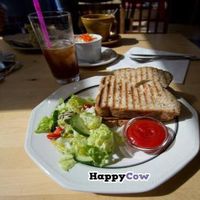 Vegan grilled tofu sandwich with mushrooms instead of cheese. Comes with a salad and some ketchup. at C is for Cookie in Reykjavik