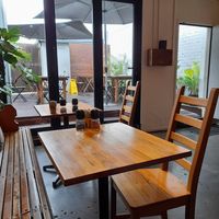 Indoors and outdoor deck at Stones Throw Cafe in Stones Corner