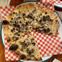 Build your own vegan pizza EVOO, shrooms, olives, red onion and garlic!   at Pisano's Woodfired Pizza in Bend