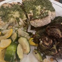 Cauliflower steak with Brussel sprouts & courgettes   at Libby's in Sarasota