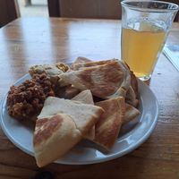 Griekse pita met paprika-tapenade en hummus at De VerbroederIJ in Amsterdam